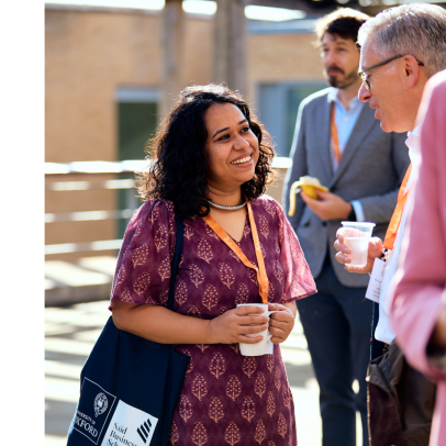 Simeen Kaleem chatting at the Skoll Community Convening 2023.