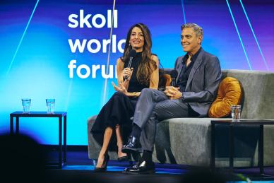 George and Amal Clooney at Skoll World Forum 2024 Closing Plenary.