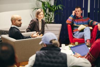 Marya Besharov, Jeremy Spafford and Karim Harji at a seminar talking.