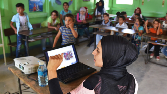 Thaki woman teacher in a classroom